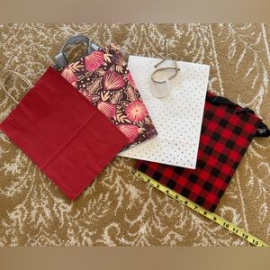 Six Holiday gift bags! 1 wine bag, 4 med size decorative bags and 1 mini bag